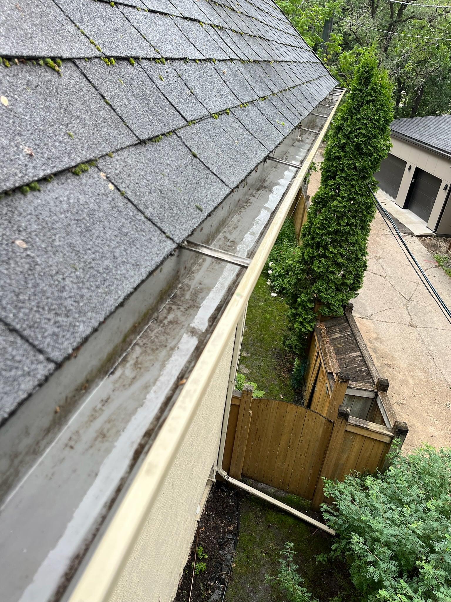 Clear eavestrough after professional cleaning